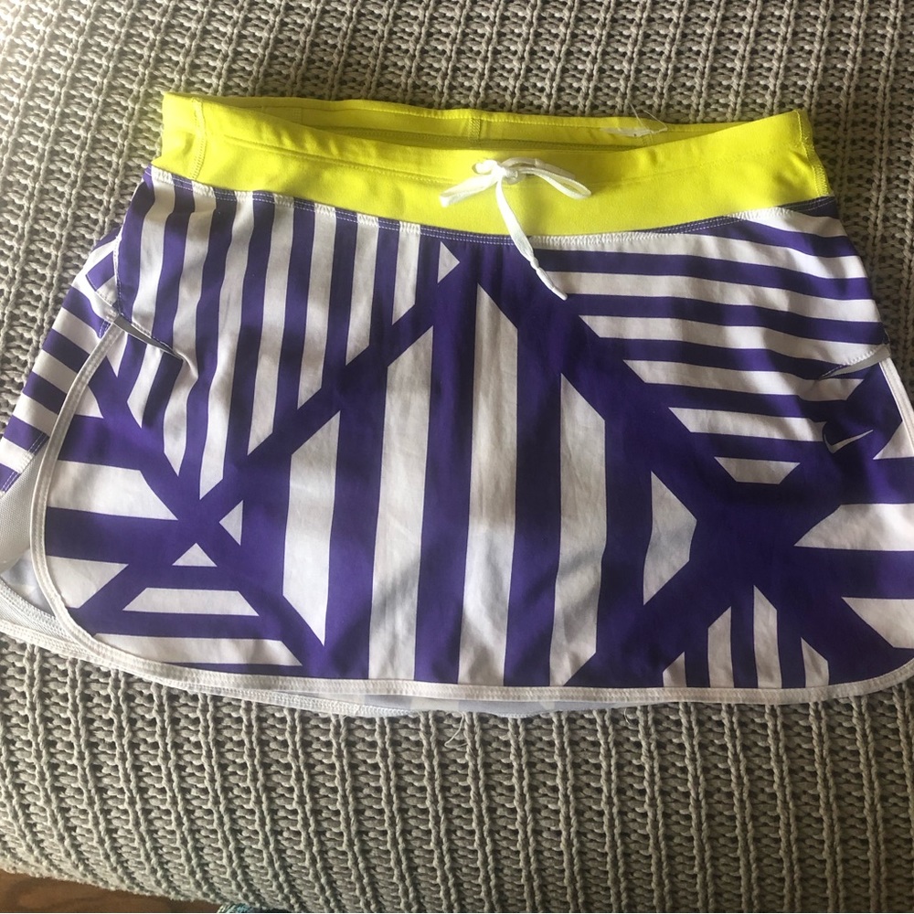 Darling Nike purple, yellow and white skirt short in a  fabulous patter. Size:S